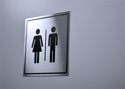 toiletskilt med symbolerne dame og mand